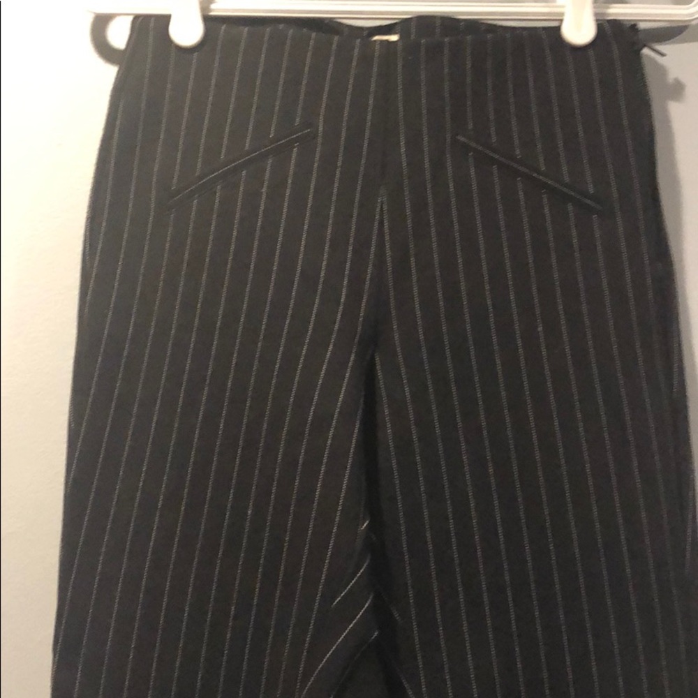 Pair of black lightly striped dress pant.